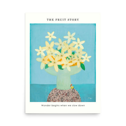 Orange Poster from The Fruit Story showing pale yellow orange blossoms in a light green vase on a patterned table, with the printed message “Wonder begins when we slow down.”