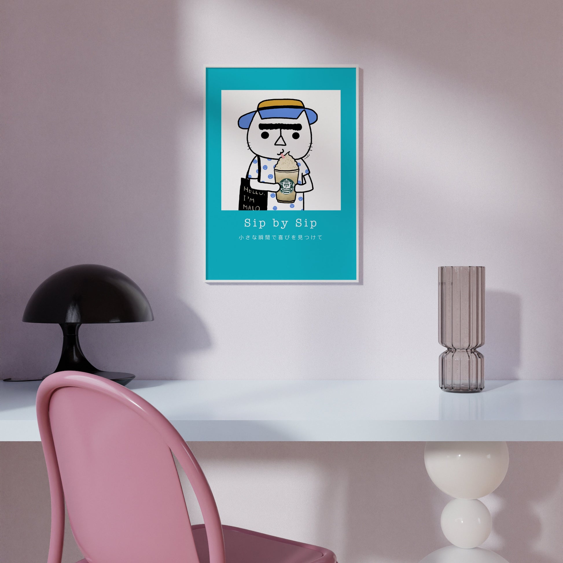 Sip by Sip – cozy cat illustration from the Malo Collection, shown as wall art displayed in a modern living room setting