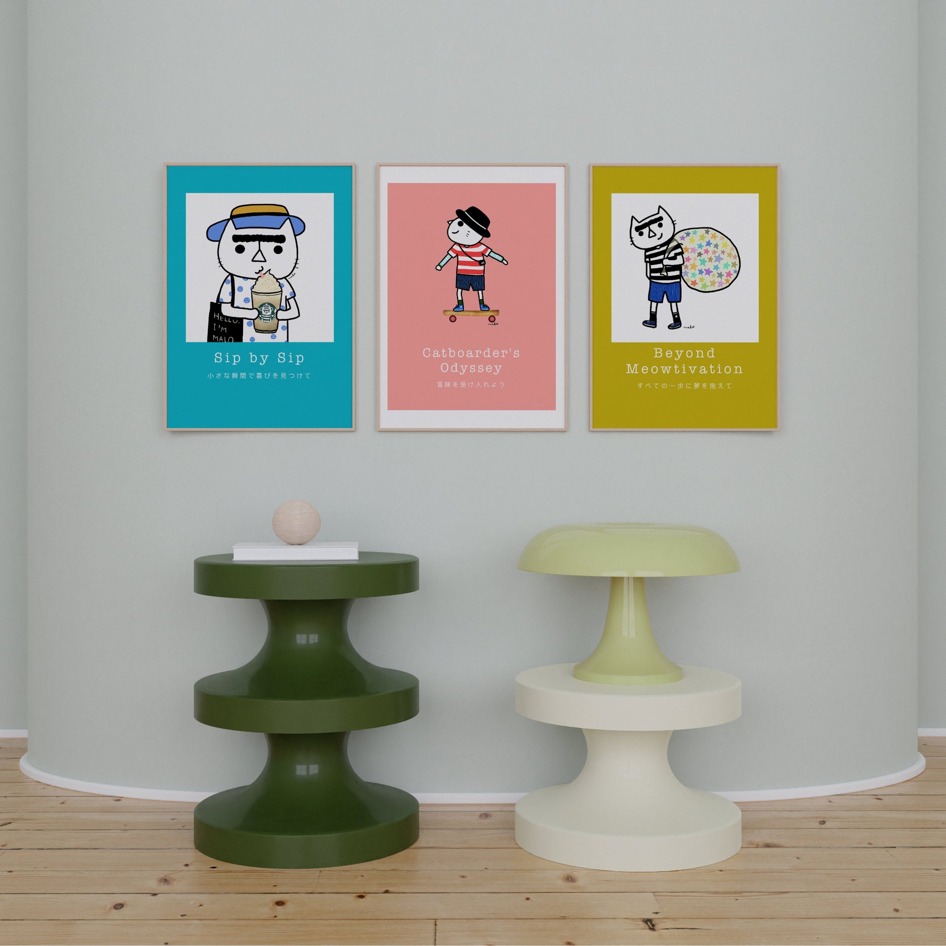 Sip by Sip – cozy cat illustration from the Malo Collection, shown as wall art displayed in a living room