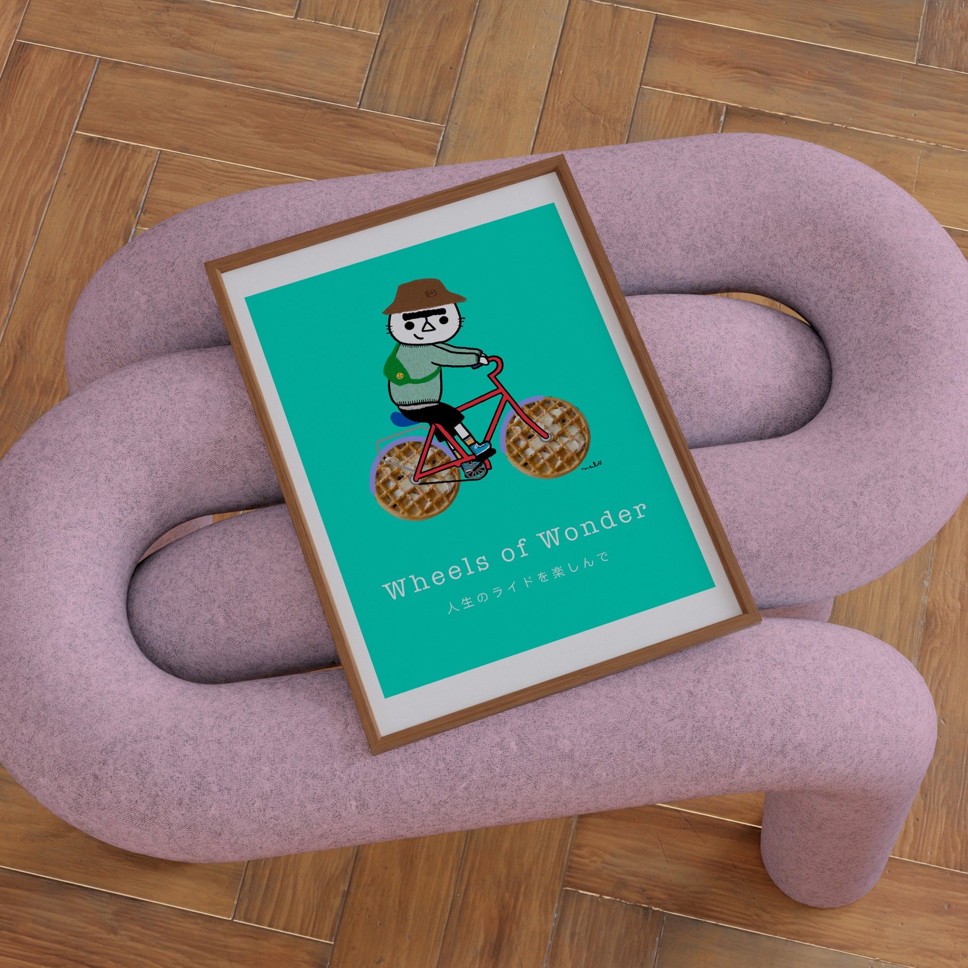 Wheels of Wonder – playful cat illustration from the Malo Collection, shown as wall art displayed in a modern living room 01